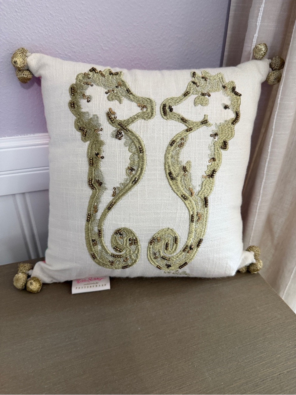 Lilly Pulitzer X Pottery Barn seahorse pillow.